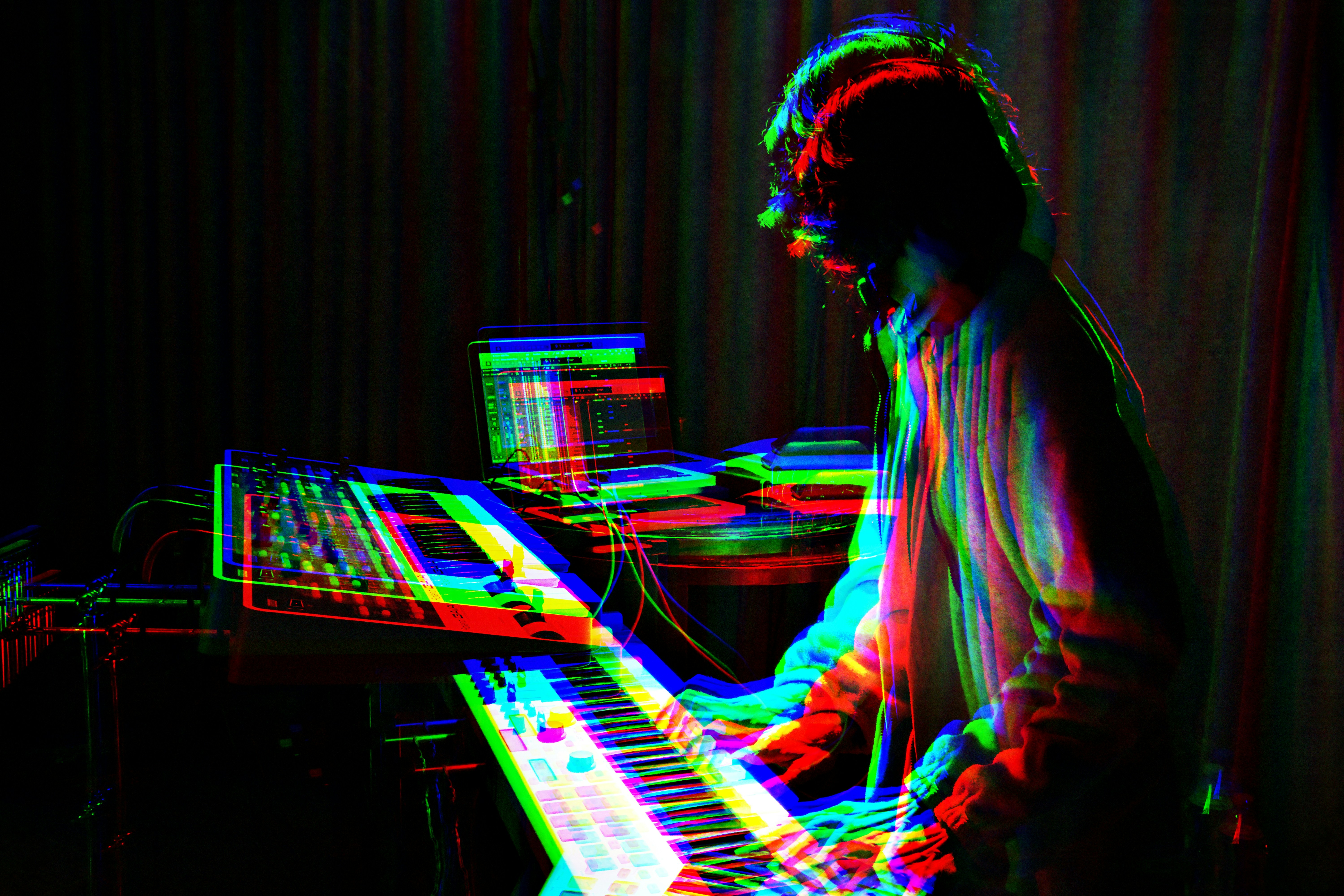 Hands on a mixing console